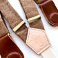 Close-up of Nutmeg Brown Women's Magnetic Suspenders with Cognac Leather Attachments by Stratton Suspender Co. – Handmade in Texas with premium linen straps and vintage-inspired leather clasps. Perfect for casual wear, vintage style, and Austin Texas street fashion.