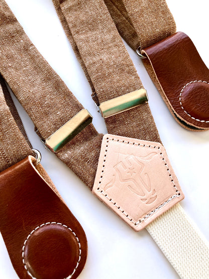 Close-up of Nutmeg Brown Women's Magnetic Suspenders with Cognac Leather Attachments by Stratton Suspender Co. – Handmade in Texas with premium linen straps and vintage-inspired leather clasps. Perfect for casual wear, vintage style, and Austin Texas street fashion.
