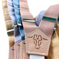 Pastel women’s suspenders with natural leather back patch, handmade in Texas.