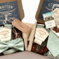 Pistachio green wedding suspenders and bow tie set with wooden buttons and sewing kit, groomsmen gift by Stratton Suspender Co., handmade in Austin, Texas.