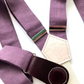 Plum linen women’s suspenders with wine leather magnetic clasps, close-up view of premium stitching and fabric.