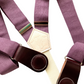 Detail shot of plum linen straps and wine leather magnetic clasps with premium stitching.
