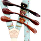 Powder blue vintage floral linen suspenders with tan, cognac, and chocolate leather button-on ends and gold hardware, handmade by Stratton Suspender Co. in Texas for groom and groomsmen wedding attire.