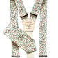 Rustic orange floral suspenders with matching tie set in vintage calico pattern, handmade by Stratton Suspender Co. for rustic weddings, groomsmen attire, and coordinated menswear styling.