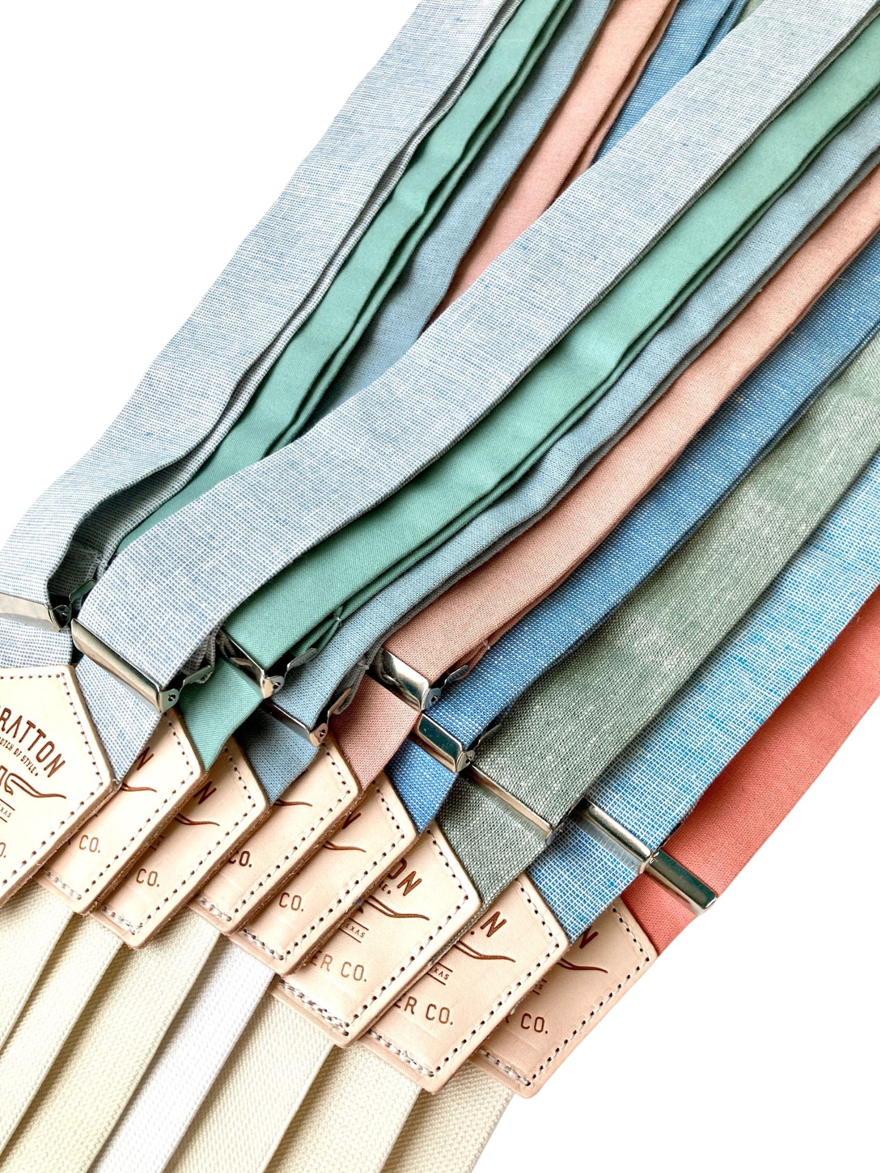 Spring and summer pastel linen suspenders collection from Stratton Suspender Co., featuring handmade shades like powder blue, sage, dusty blue, dusty rose, French blue, sea glass, prairie sky blue, and coral—ideal for weddings, groomsmen, and warm-weather menswear.
