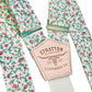 Close-Up of Tangerine Orange & Emerald Green Floral Suspender Straps – Vintage-Inspired Fabric Design – Handmade in Texas