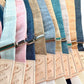 A curated collection of linen wedding suspenders in Teal, Pastel Pink, Peacock, Taupe, Sky Blue, Tan, Turquoise, Heather, Peach Fuzz, and Navy. Perfect for groomsmen, rustic weddings, and formal outdoor events. Handmade with premium leather details for timeless elegance.