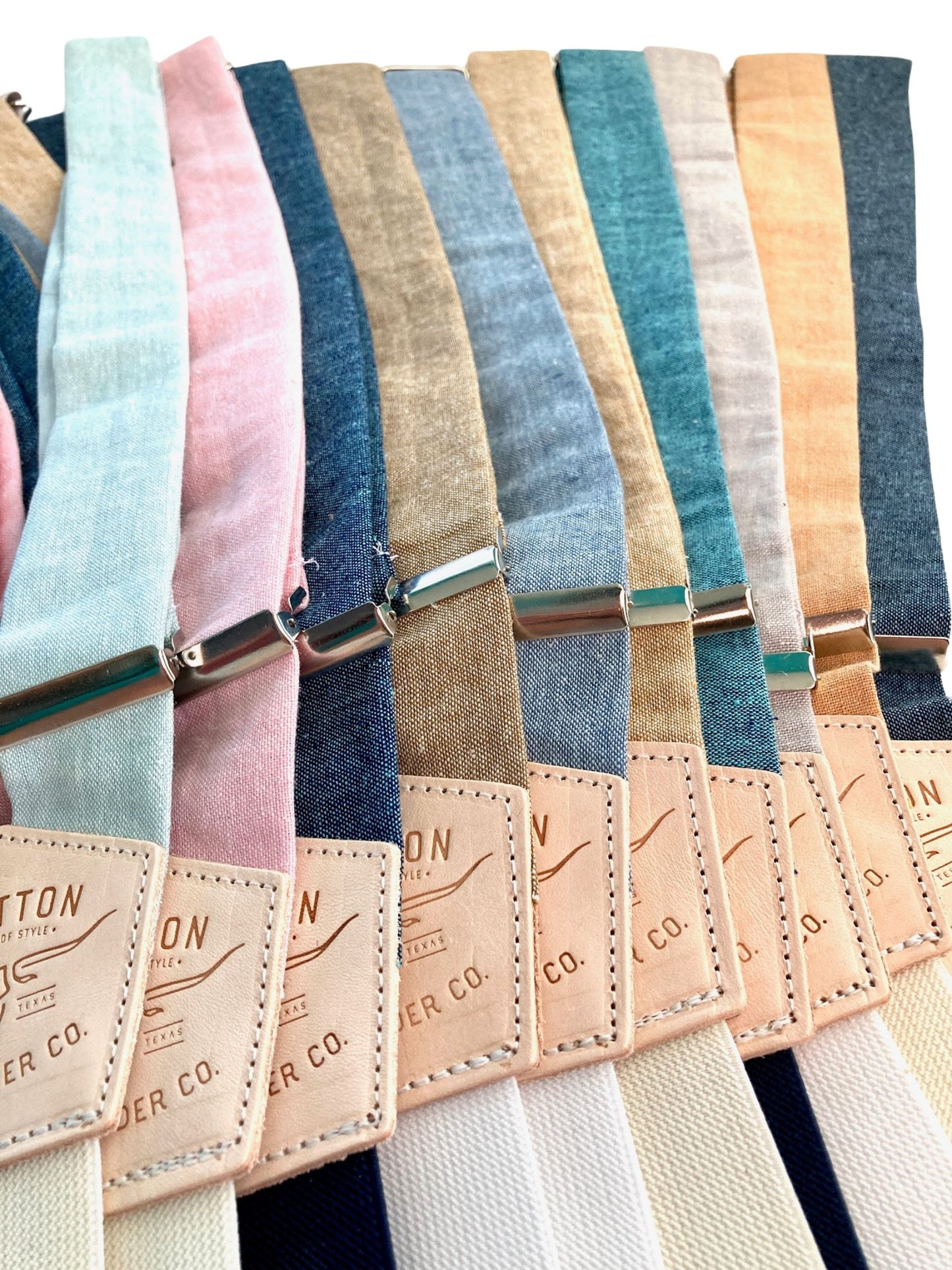 A curated collection of linen wedding suspenders in Teal, Pastel Pink, Peacock, Taupe, Sky Blue, Tan, Turquoise, Heather, Peach Fuzz, and Navy. Perfect for groomsmen, rustic weddings, and formal outdoor events. Handmade with premium leather details for timeless elegance.