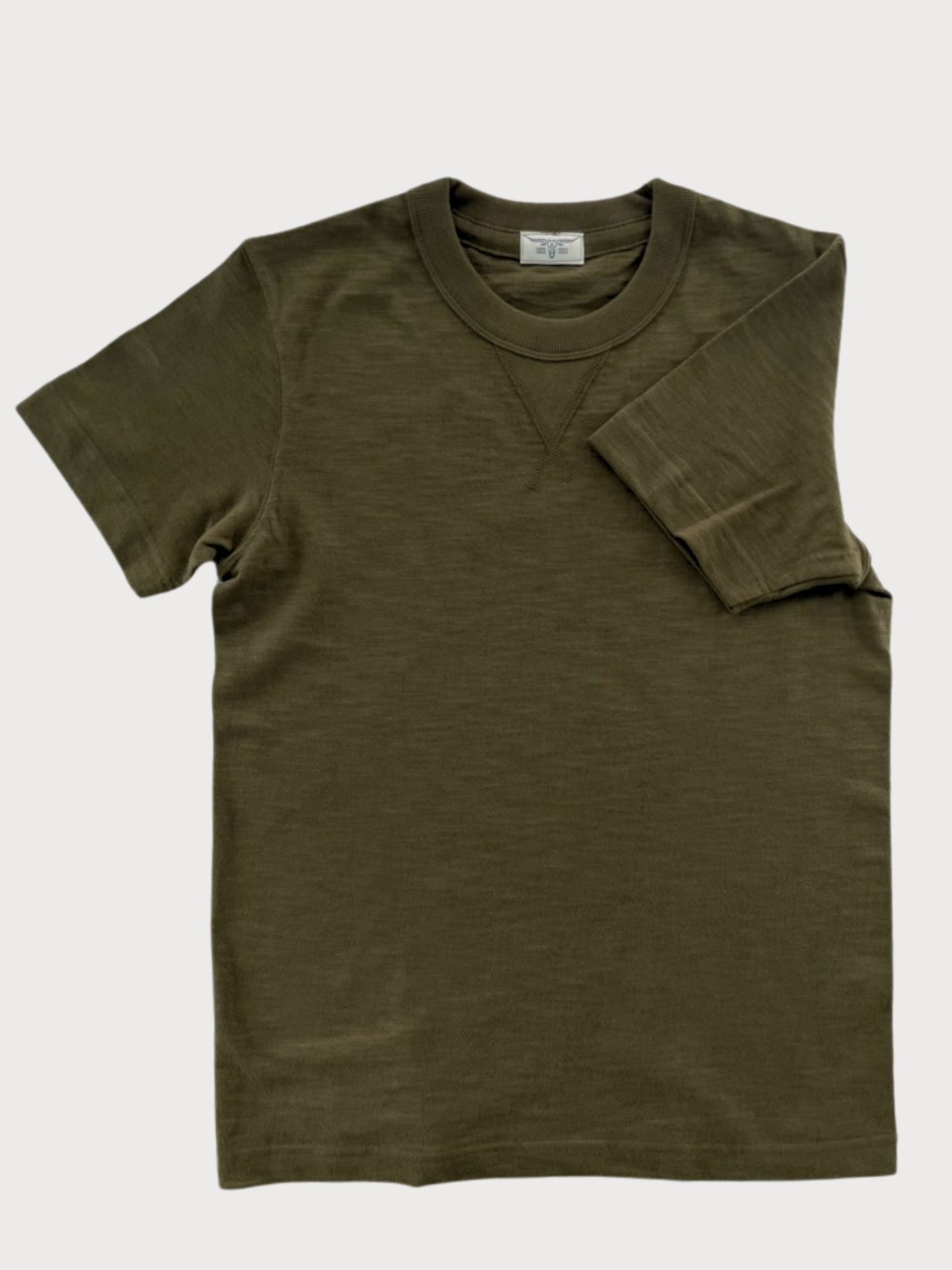 Vintage 1940s Heavyweight T-Shirt in Olive Drab by Stratton Suspender Co. Inspired by classic military and workwear styles, this heavyweight cotton tee features a reinforced V-gusset neckline and a rugged fit. Ethically made in the USA for heritage menswear enthusiasts.