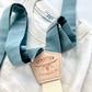 Vintage 1940s Heavyweight T-Shirt in White paired with Dusty Blue Suspenders by Stratton Suspender Co. Featuring a classic V-gusset neckline and ethically made in the USA, this rugged menswear set embodies timeless American workwear and heritage craftsmanship.