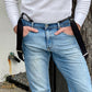 Close-up of a vintage 1940s heavyweight white waffle knit thermal shirt paired with black suspenders and vintage Levi’s denim. A rugged workwear-inspired look featuring ethically made American craftsmanship. Made in the USA by Stratton Suspender Co.