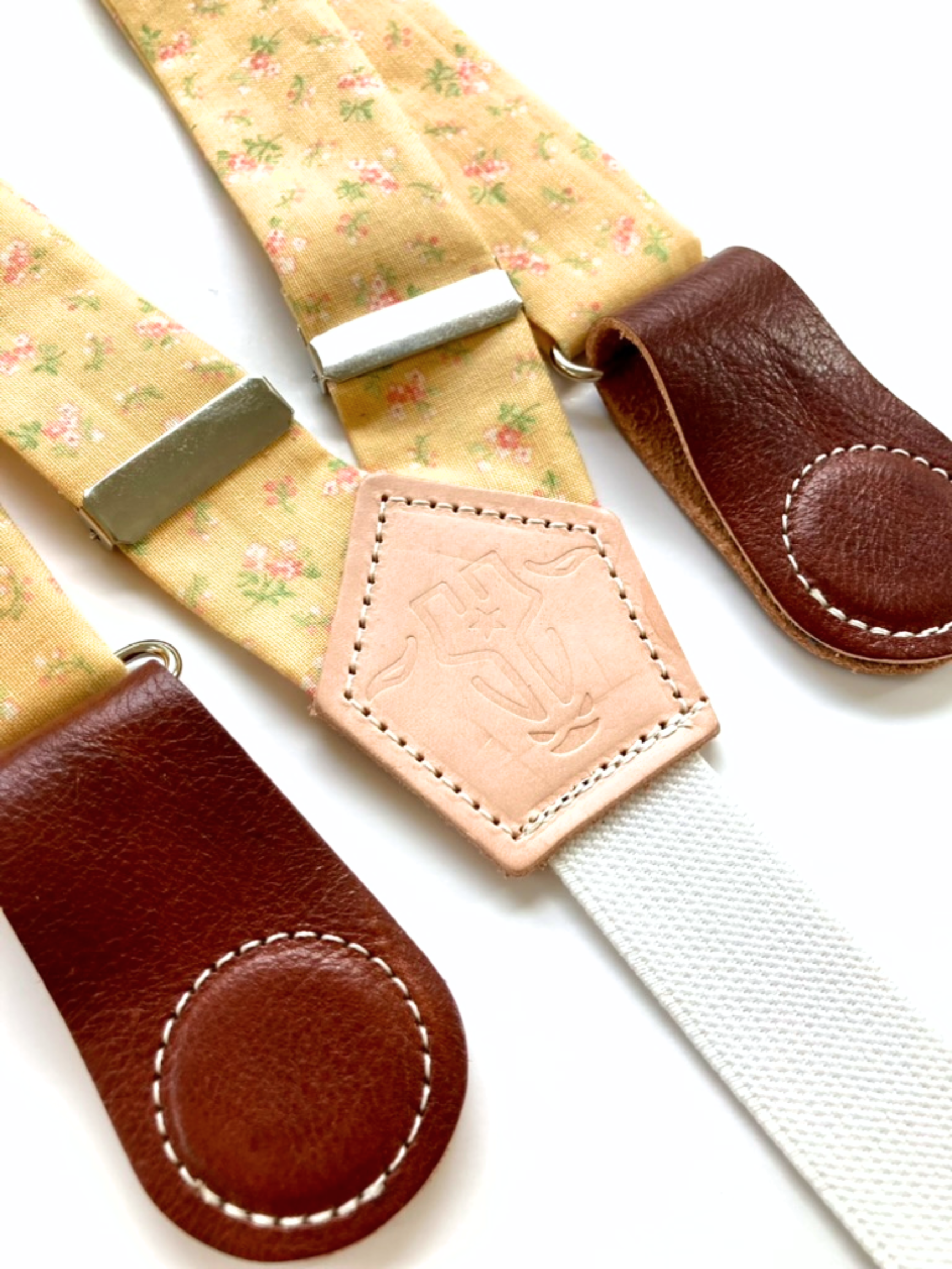 Vintage Blossom Yellow women’s floral suspenders with leather magnetic clasps, handmade in Texas.