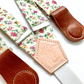 Vintage rose garden floral women’s suspenders with leather magnetic clasps, handmade in Texas for spring and summer outfits.