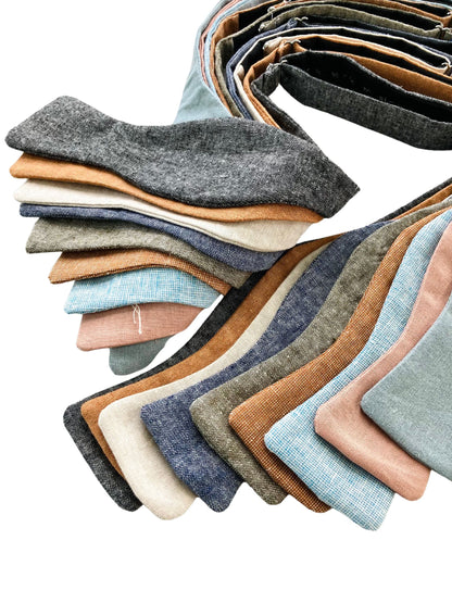 Vintage-style self-tie linen bow ties in trending wedding colors including powder blue, dusty blue, dusty rose, beige, black, olive, and burnt orange. Perfect for groomsmen, formalwear, and rustic or boho weddings.