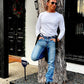 Model wearing a Vintage 1940s Waffle Knit Thermal Shirt with Classic Black Linen Button Suspenders and vintage Levi’s jeans. Styled with black boots and aviator sunglasses for a rugged heritage look. Ethically made in the USA by Stratton Suspender Co., blending classic American workwear with timeless style.