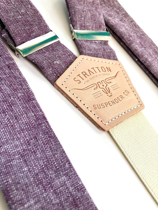 Stratton Suspender Co. features the Purple linen suspenders on veg tan shoulder leather with cream colored elastic back strap for the Fall 2022 suspenders collection 