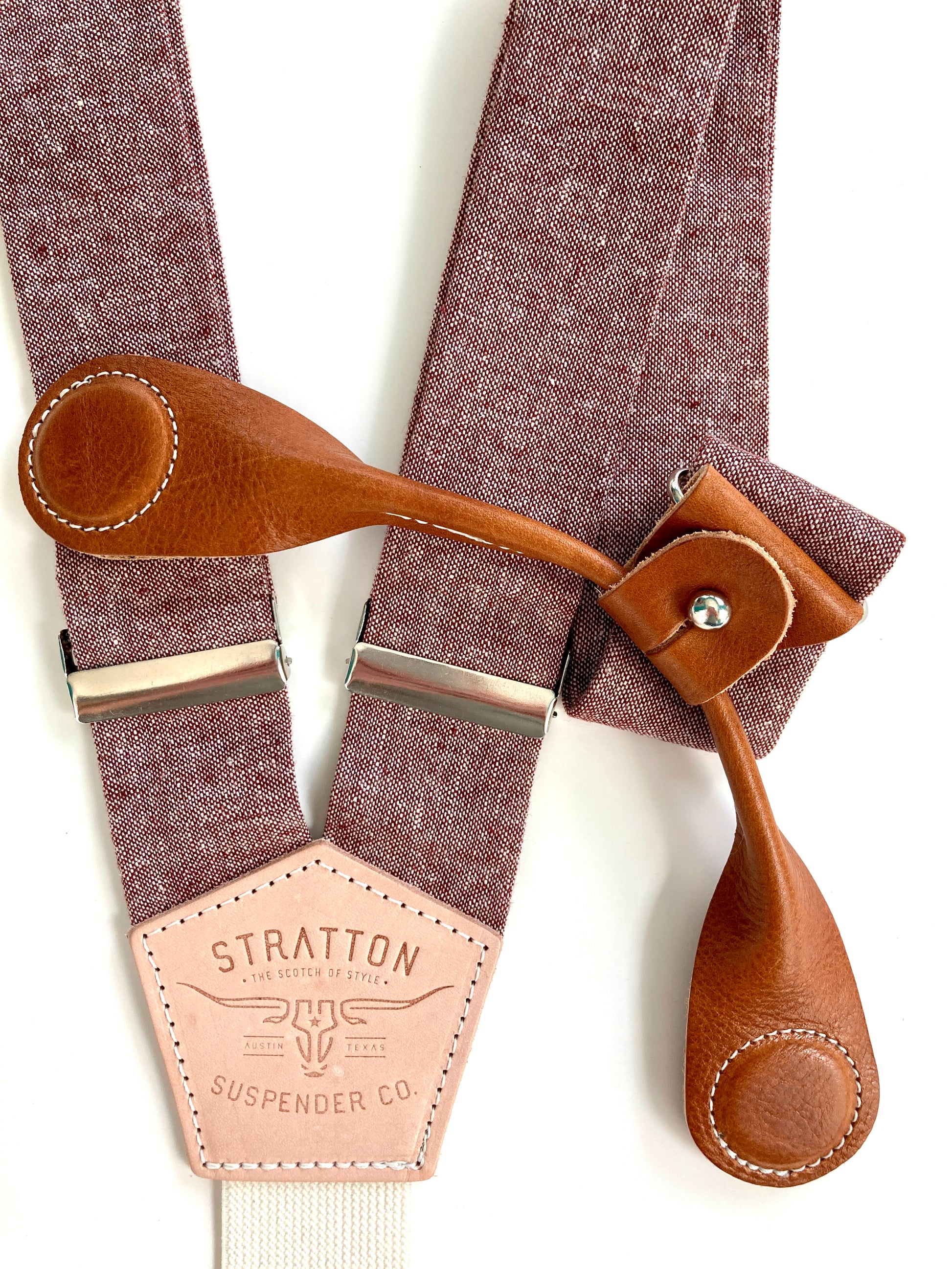 Stratton Suspender Co. features the Rust (Maroon) linen suspenders on veg tan shoulder leather with cream colored elastic back strap for the Fall 2022 suspenders collection Magnetic Stratton Suspender clasps in Tan Pontedero Italian leather hand-picked by Stratton Suspender Co.