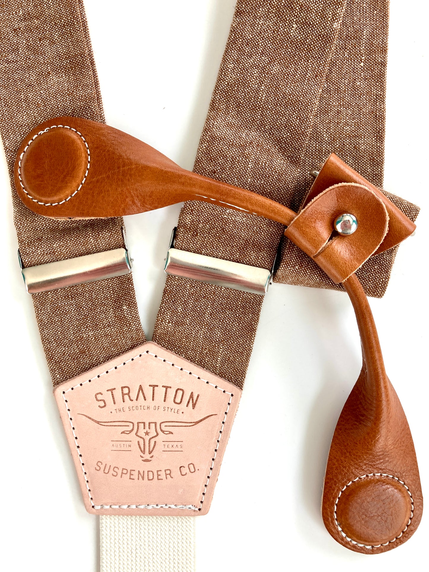 Stratton Suspender Co. features the Nutmeg (brown) linen suspenders on veg tan shoulder leather with cream colored elastic back strap for the Fall 2022 suspenders collection Magnetic Stratton Suspender clasps in Tan Pontedero Italian leather hand-picked by Stratton Suspender Co.
