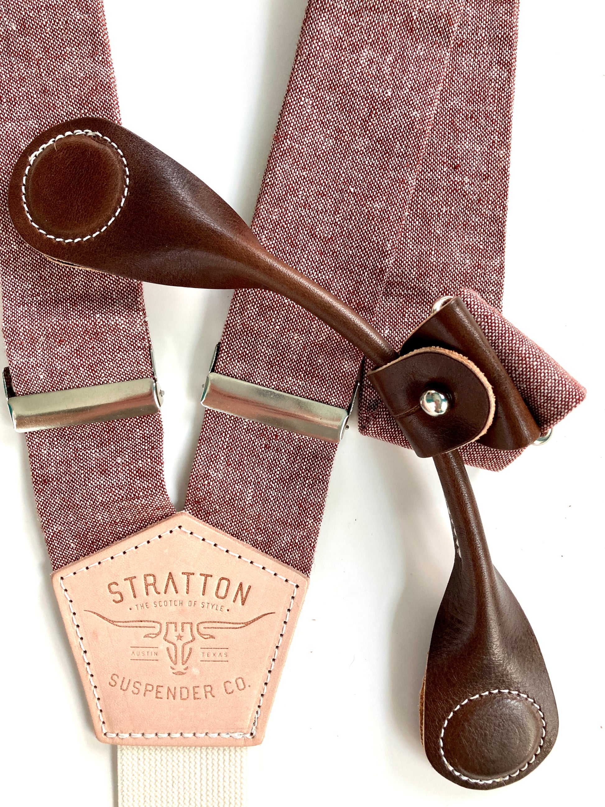 Stratton Suspender Co. features the Rust (Maroon) linen suspenders on veg tan shoulder leather with cream colored elastic back strap for the Fall 2022 suspenders collection Magnetic Stratton Suspender clasps in Chocolate Pontedero Italian leather hand-picked by Stratton Suspender Co.