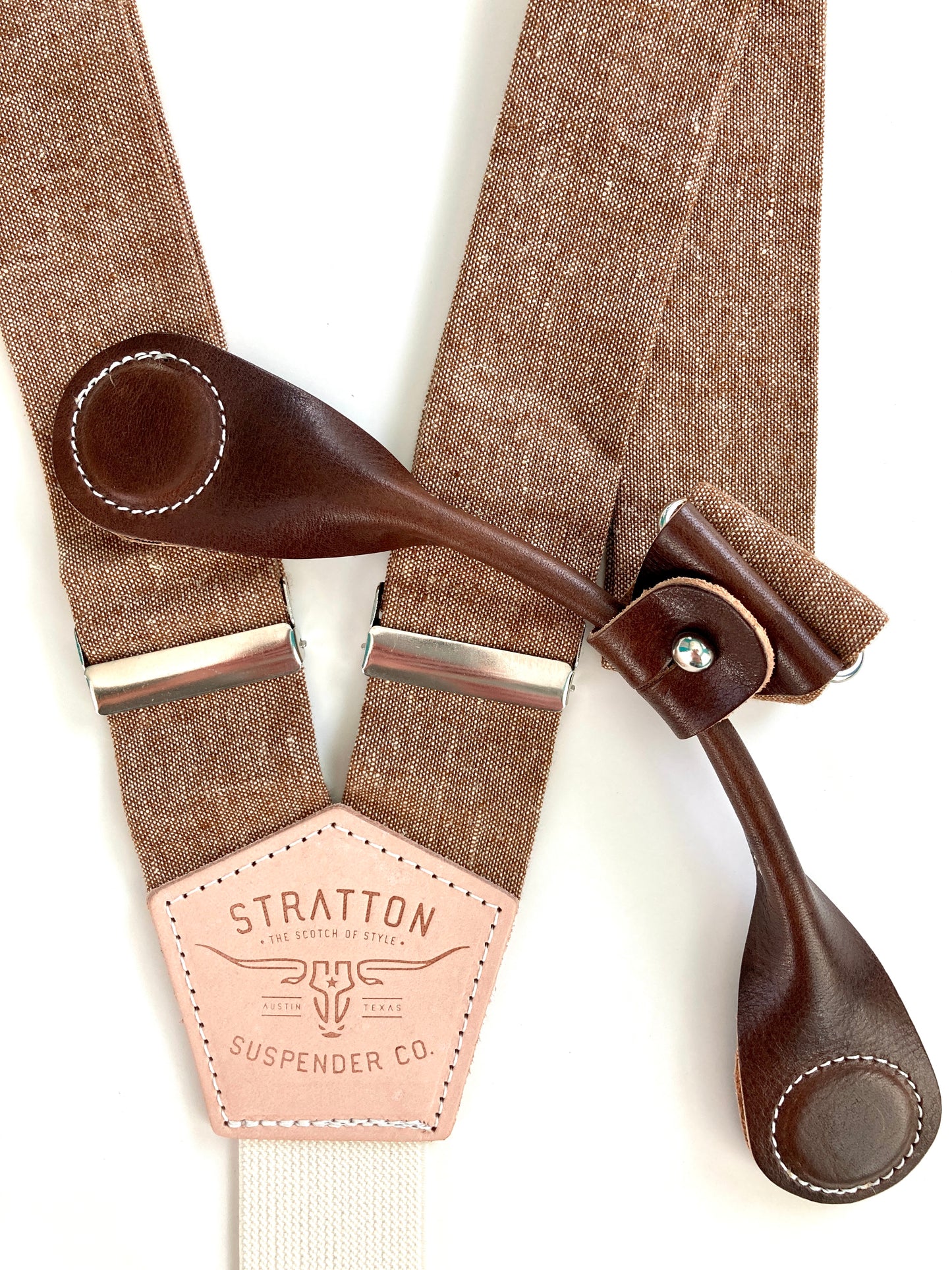 Stratton Suspender Co. features the Nutmeg (brown) linen suspenders on veg tan shoulder leather with cream colored elastic back strap for the Fall 2022 suspenders collection Magnetic Stratton Suspender clasps in Chocolate Pontedero Italian leather hand-picked by Stratton Suspender Co.