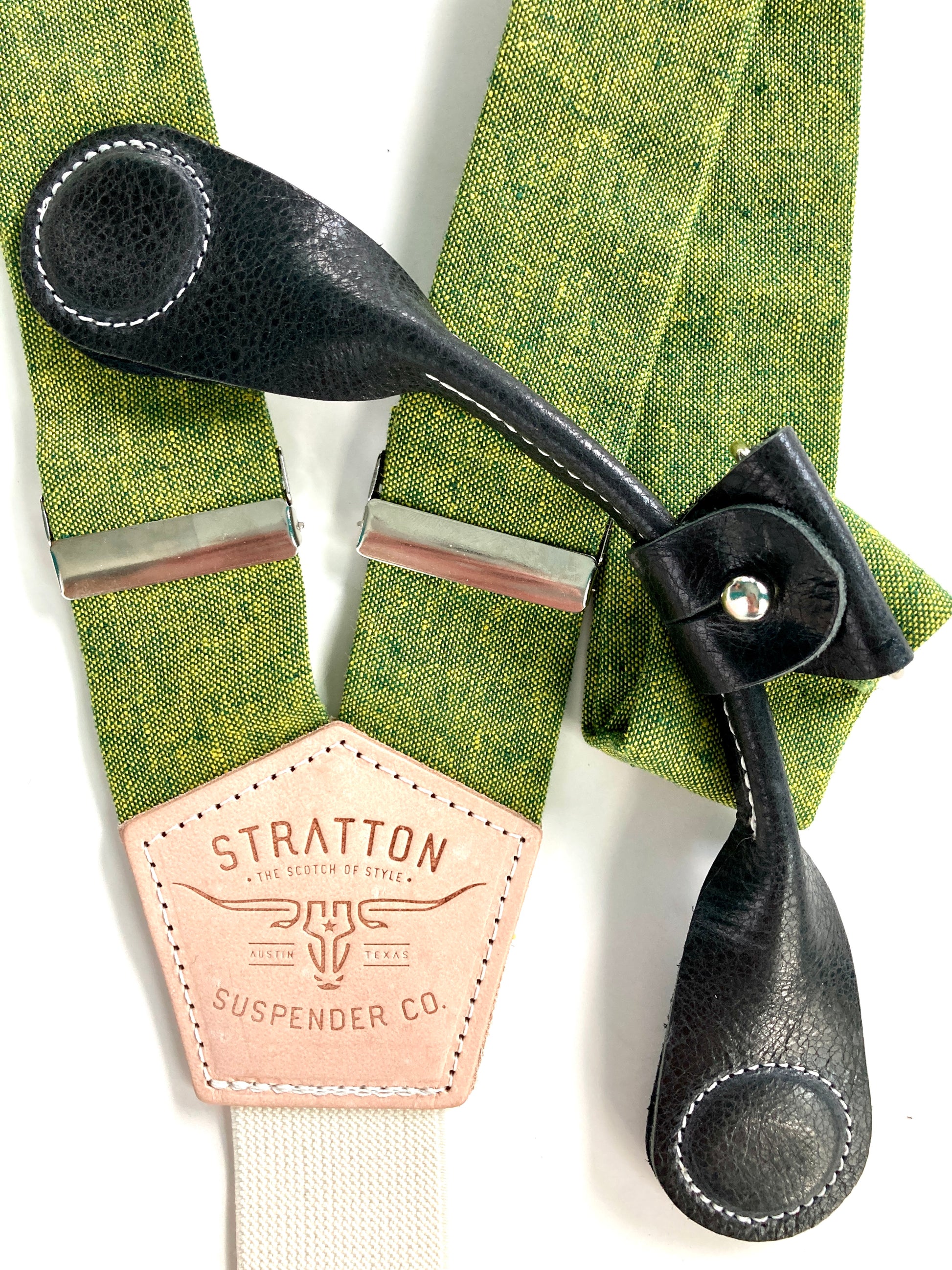 Stratton Suspender Co. features the Palm green with yellow woven threaded linen suspenders on veg tan shoulder leather with cream colored elastic back strap for the Fall 2022 suspenders collection Magnetic Stratton Suspender clasps in Black Pontedero Italian leather hand-picked by Stratton Suspender Co.