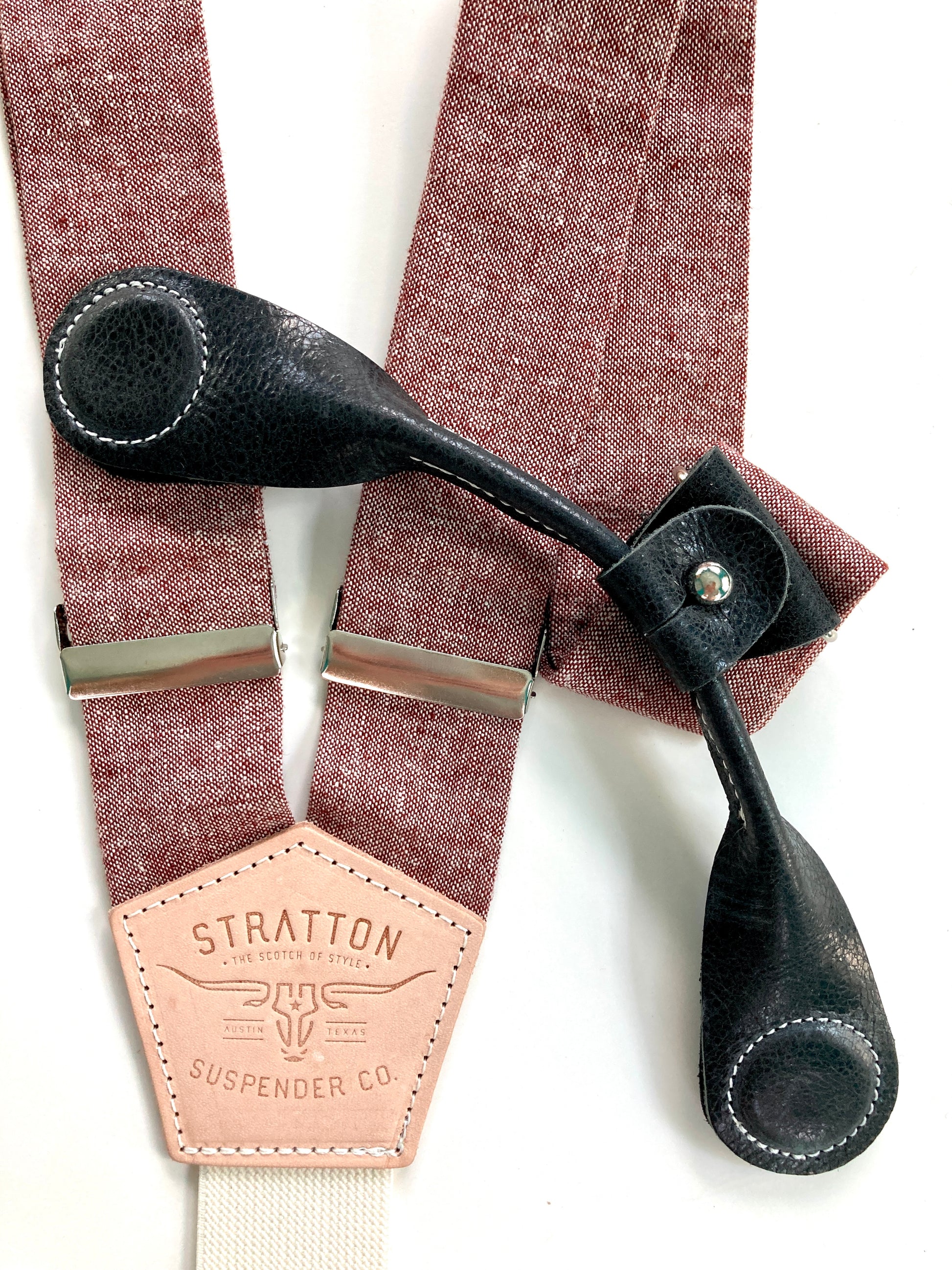 Stratton Suspender Co. features the Rust (Maroon) linen suspenders on veg tan shoulder leather with cream colored elastic back strap for the Fall 2022 suspenders collection Magnetic Stratton Suspender clasps in Black Pontedero Italian leather hand-picked by Stratton Suspender Co.