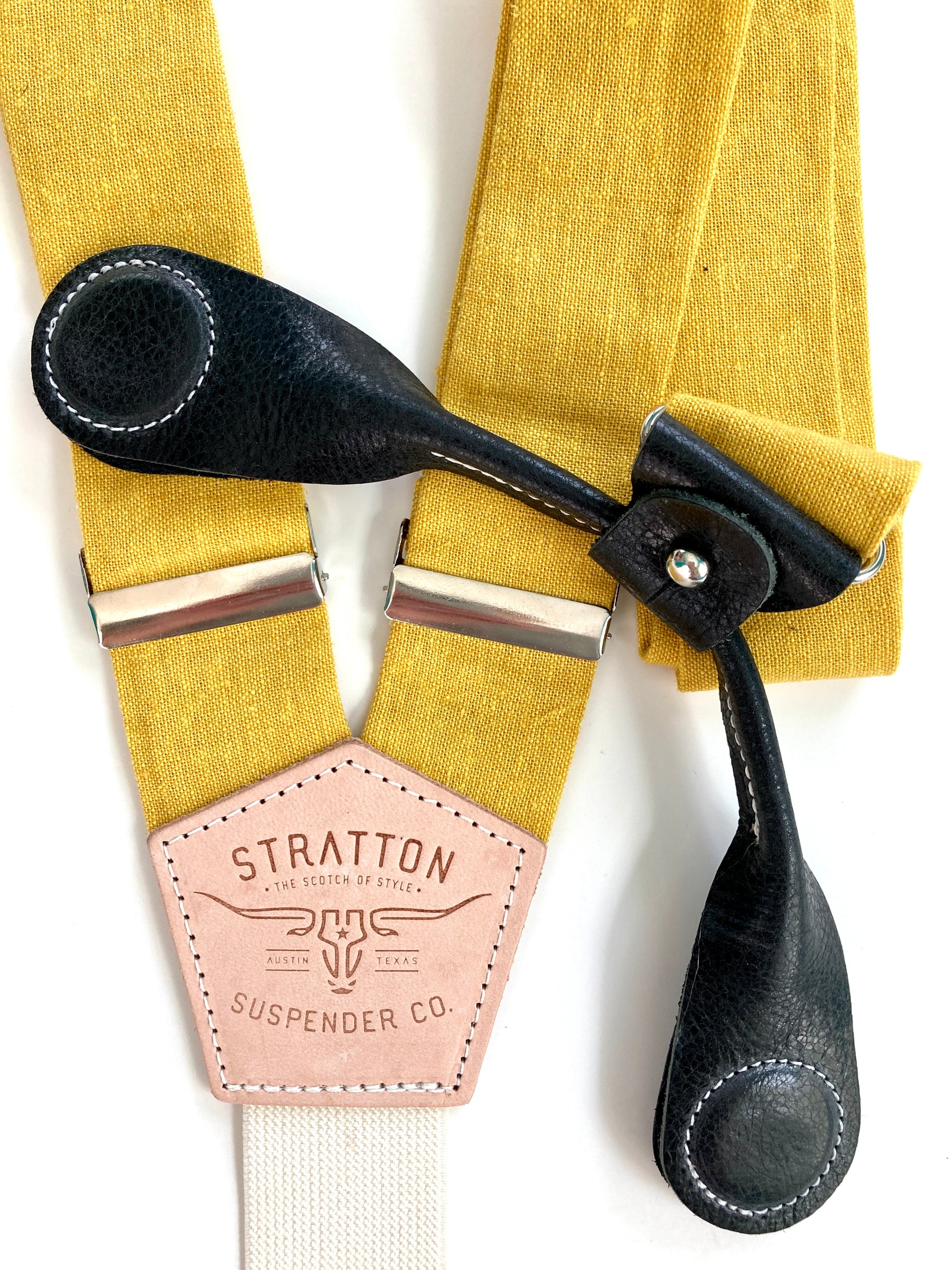 Stratton Suspender Co. features the Yellow linen suspenders on veg tan shoulder leather with cream colored elastic back strap for the Fall 2022 suspenders collection Magnetic Stratton Suspender clasps in Black Pontedero Italian leather hand-picked by Stratton Suspender Co.