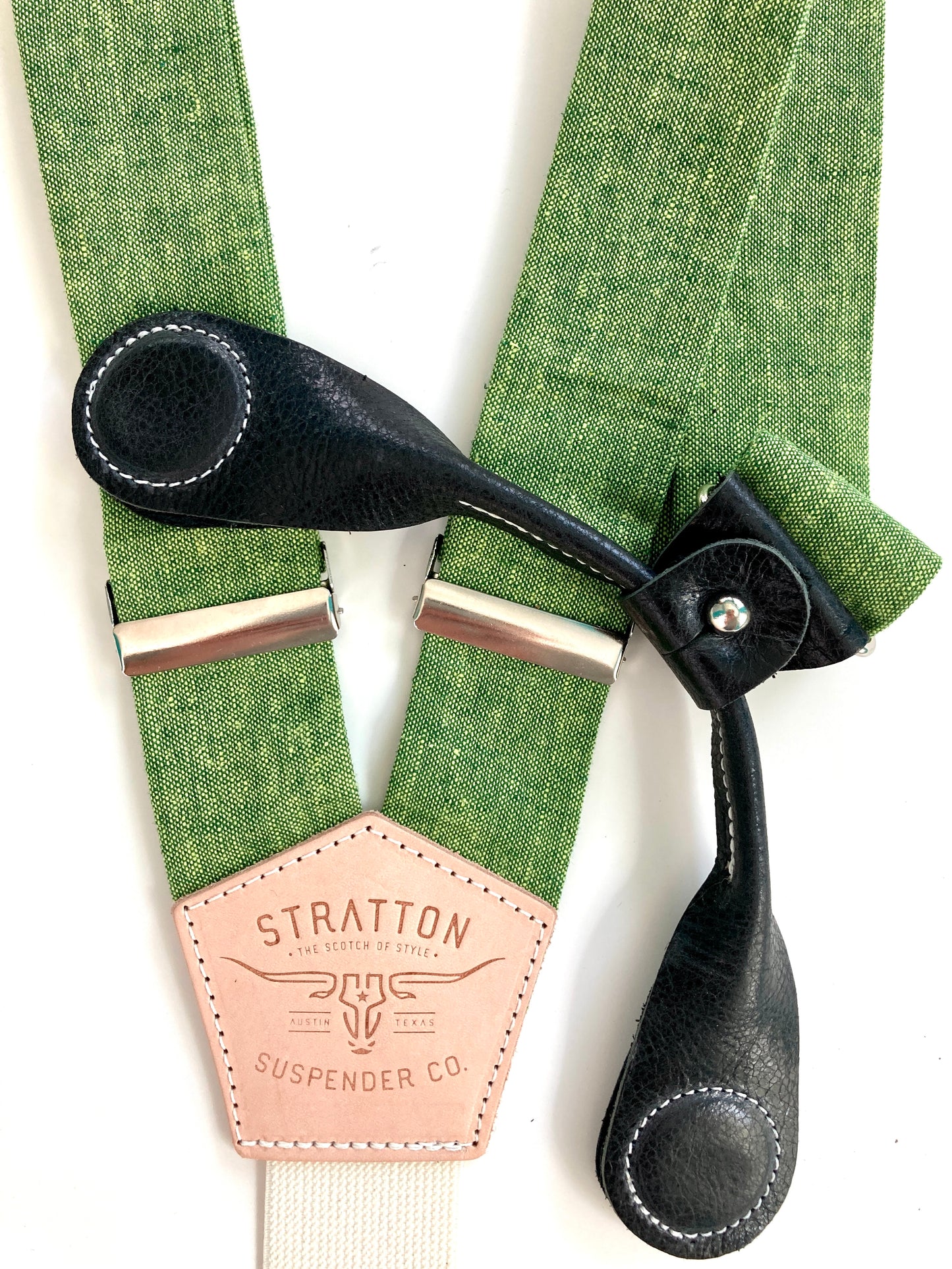 Stratton Suspender Co. features our Spruce (bright green) linen suspenders on veg tan shoulder leather with cream colored elastic back strap for the Fall 2022 suspenders collection Magnetic Stratton Suspender clasps in Black Pontedero Italian leather hand-picked by Stratton Suspender Co